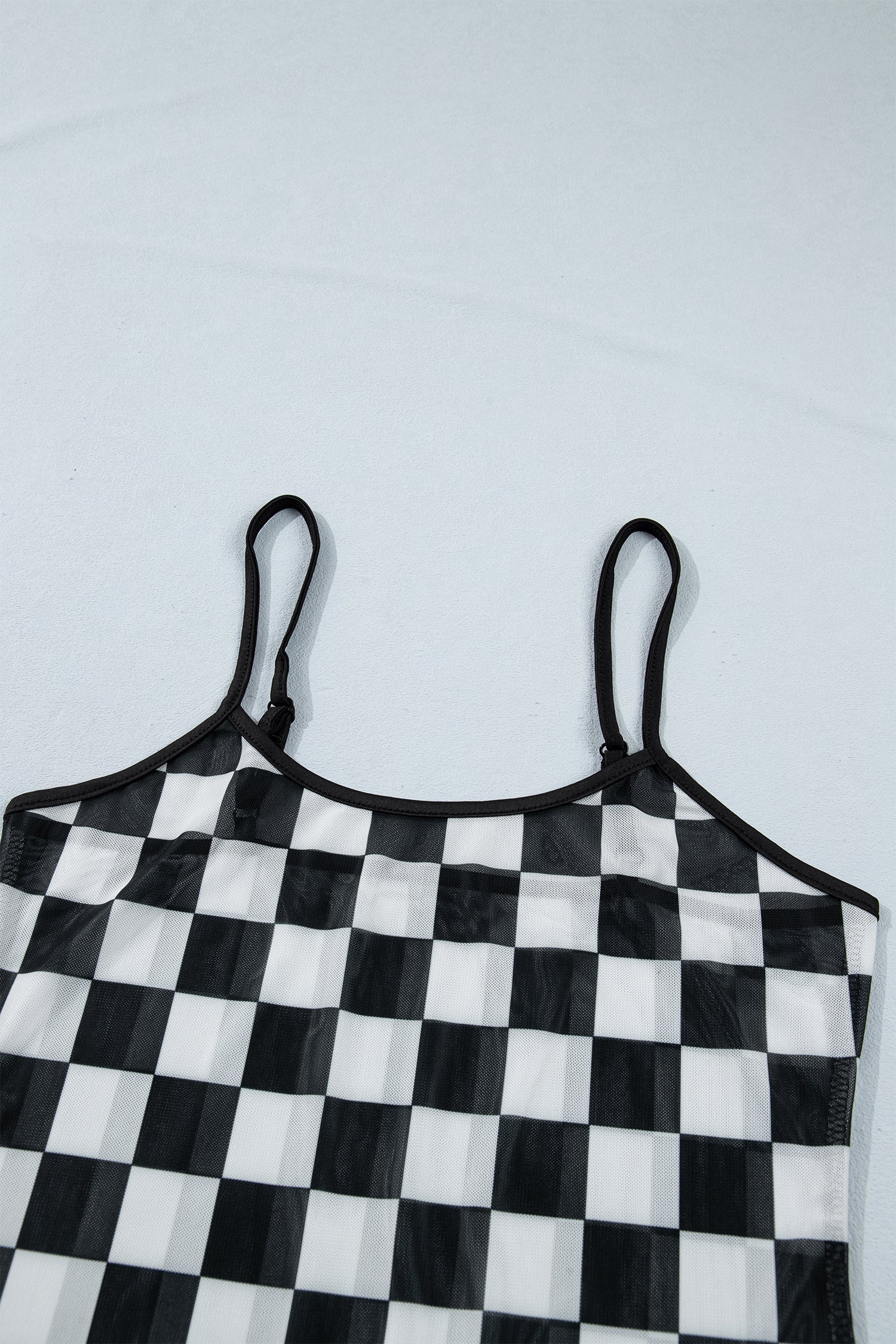 Débardeur imprimé damier, bretelles spaghetti, coupe slim — noir